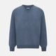 The Blue Melange Cashmere V-neck Jumper by Turnbull & Asser, featuring ribbed cuffs and hem, is part of our knitwear collection and shown against a white background.