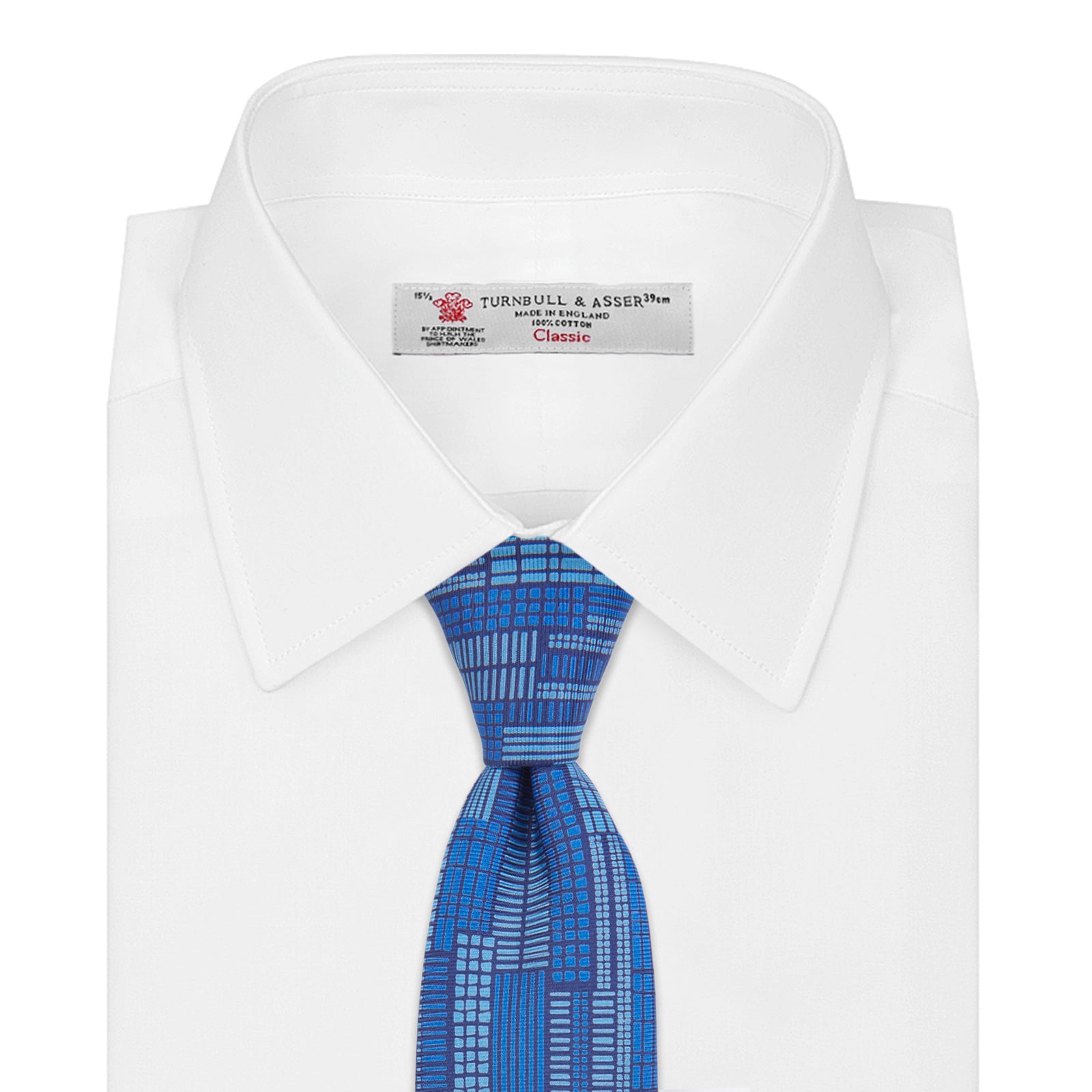 View 3 of product The Turnbull & Asser Blue Motif Printed Foulard Silk Tie showcases a geometric pattern in varying blue shades, making it a striking and essential accessory for any wardrobe.