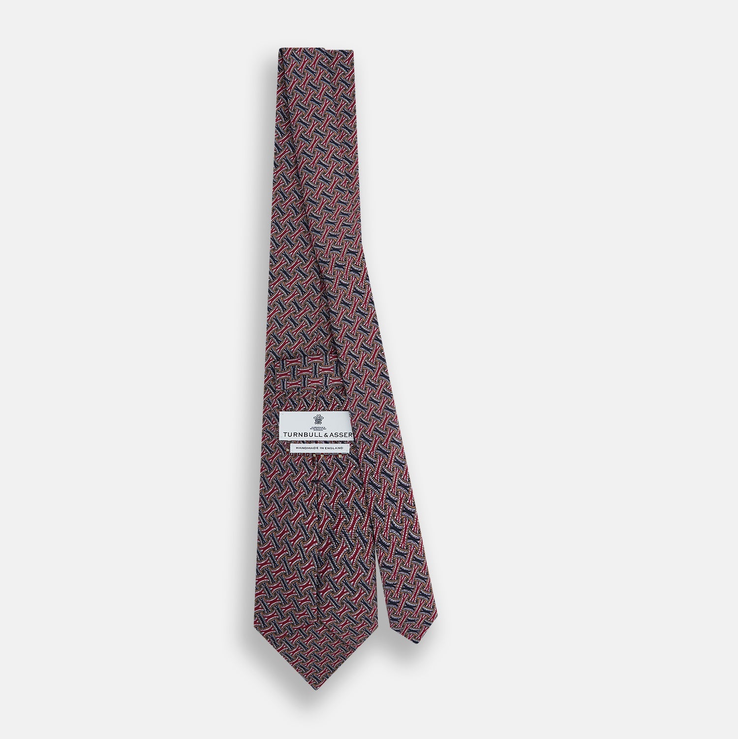 View 4 of product The Turnbull & Asser Burgundy and Navy Weave Patterned Silk Tie features a geometric design in rich tones on silk fabric.