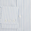 View 4 of product The Turnbull & Asser Sky Blue Combination Stripe Mayfair Shirt features long sleeves, a T&A collar, buttoned cuffs, and thin vertical stripes in blue, shown on a plain white background.