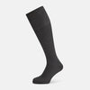 View 1 of product A single Concrete Grey Long Sock by Turnbull & Asser, featuring an over the calf fit and ribbed texture, is displayed on a plain white background.