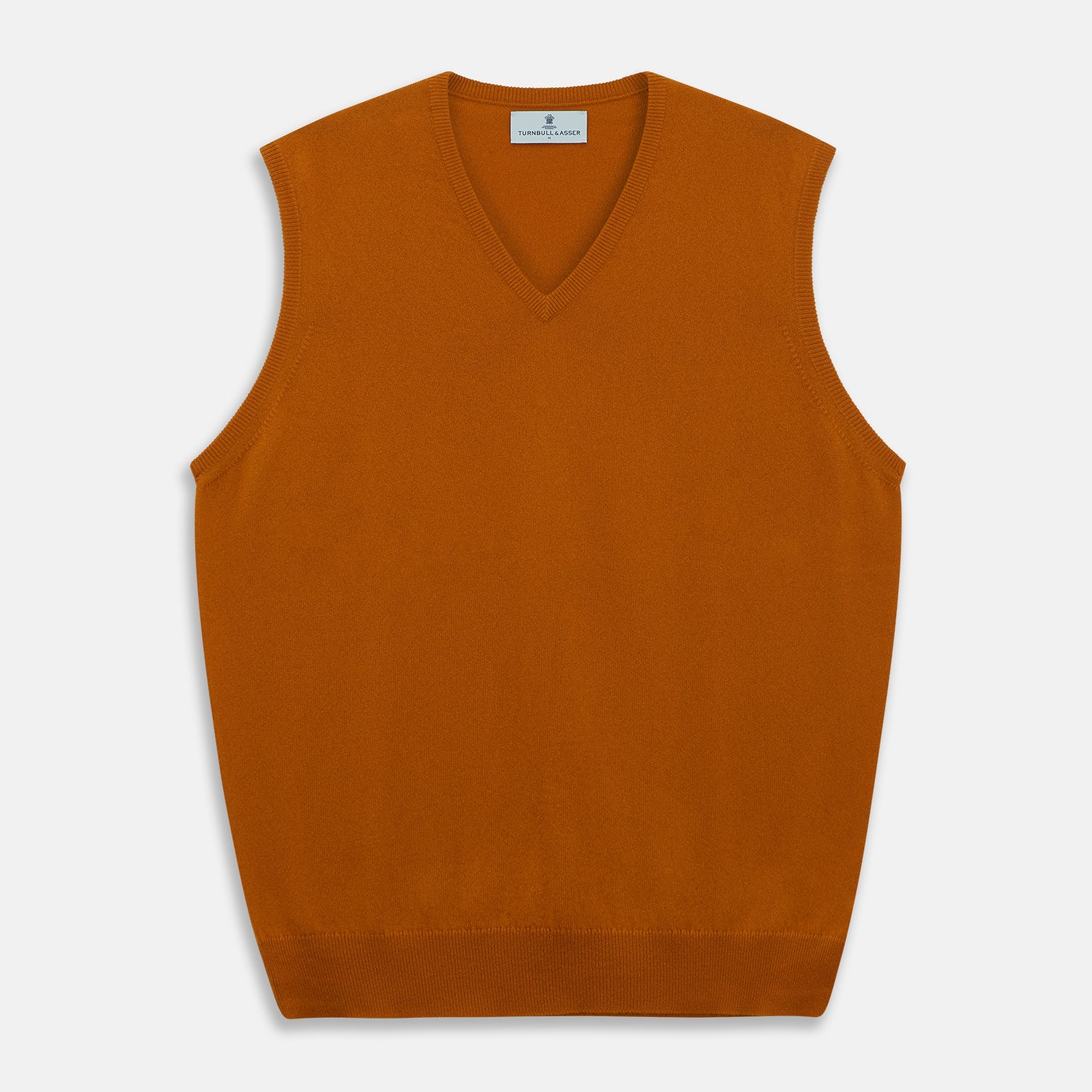 View 1 of product The Rust Ifor Slipover by Turnbull & Asser, a sleeveless V-neck in burnt orange, is made from lightweight Scottish cashmere and displayed flat on a white background.