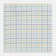 The Yellow Multi Double Grid Check Hand-Rolled Handkerchief by Turnbull & Asser is handcrafted in England, featuring a colorful check pattern with evenly spaced blue, green, yellow, and purple lines.