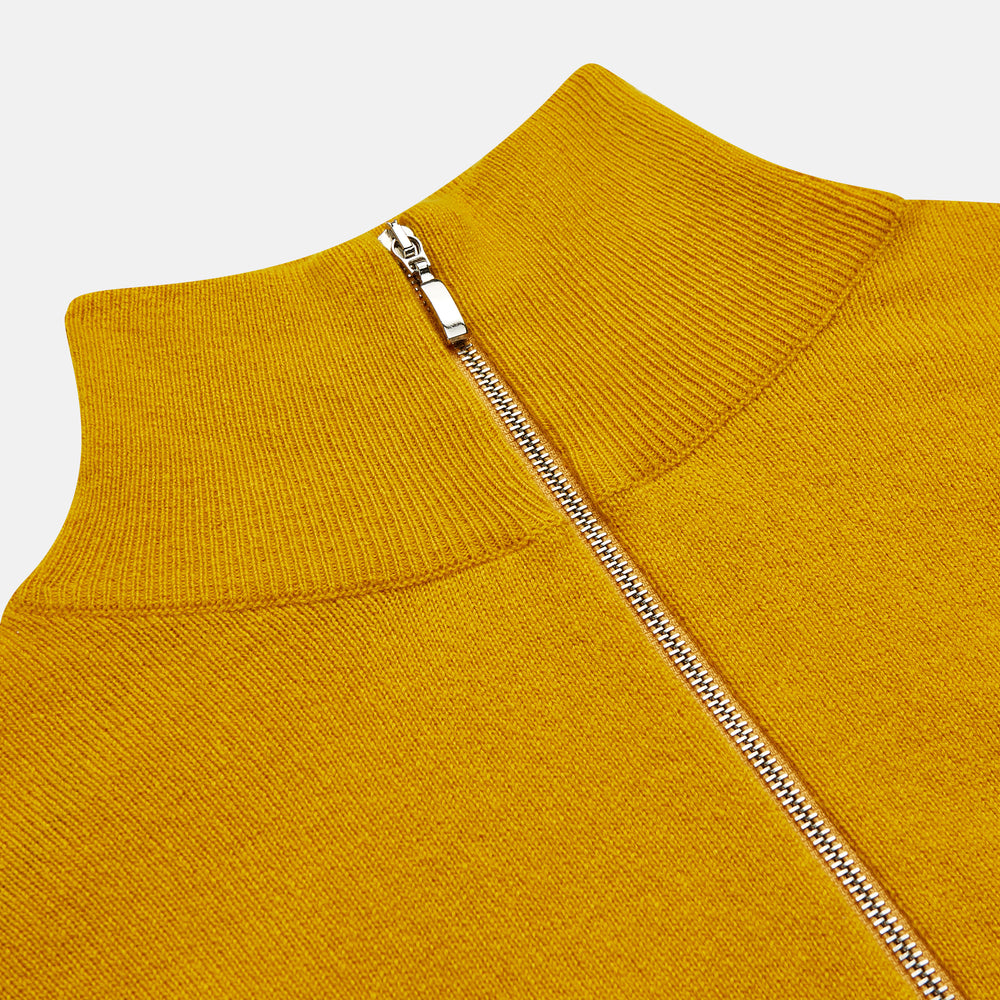 The Gold Lennox Cashmere Half-Zip Jumper by Turnbull & Asser features a high collar and is shown in mustard yellow, laid flat on a white background.