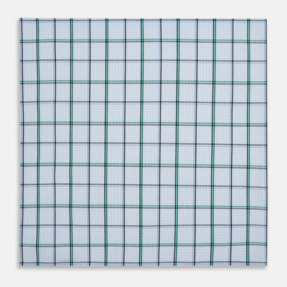 The Turnbull & Asser Hand Rolled Blue and Green Tattersall Check Handkerchief—a white cotton pocket square with blue, green, and black check pattern—is neatly displayed on a plain white background.