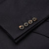 View 2 of product The Turnbull & Asser Navy Escorial Wool Jacket is a tailored men's blazer featuring notch lapels, a single-breasted one-button front, and multiple pockets, shown flat against a white background.