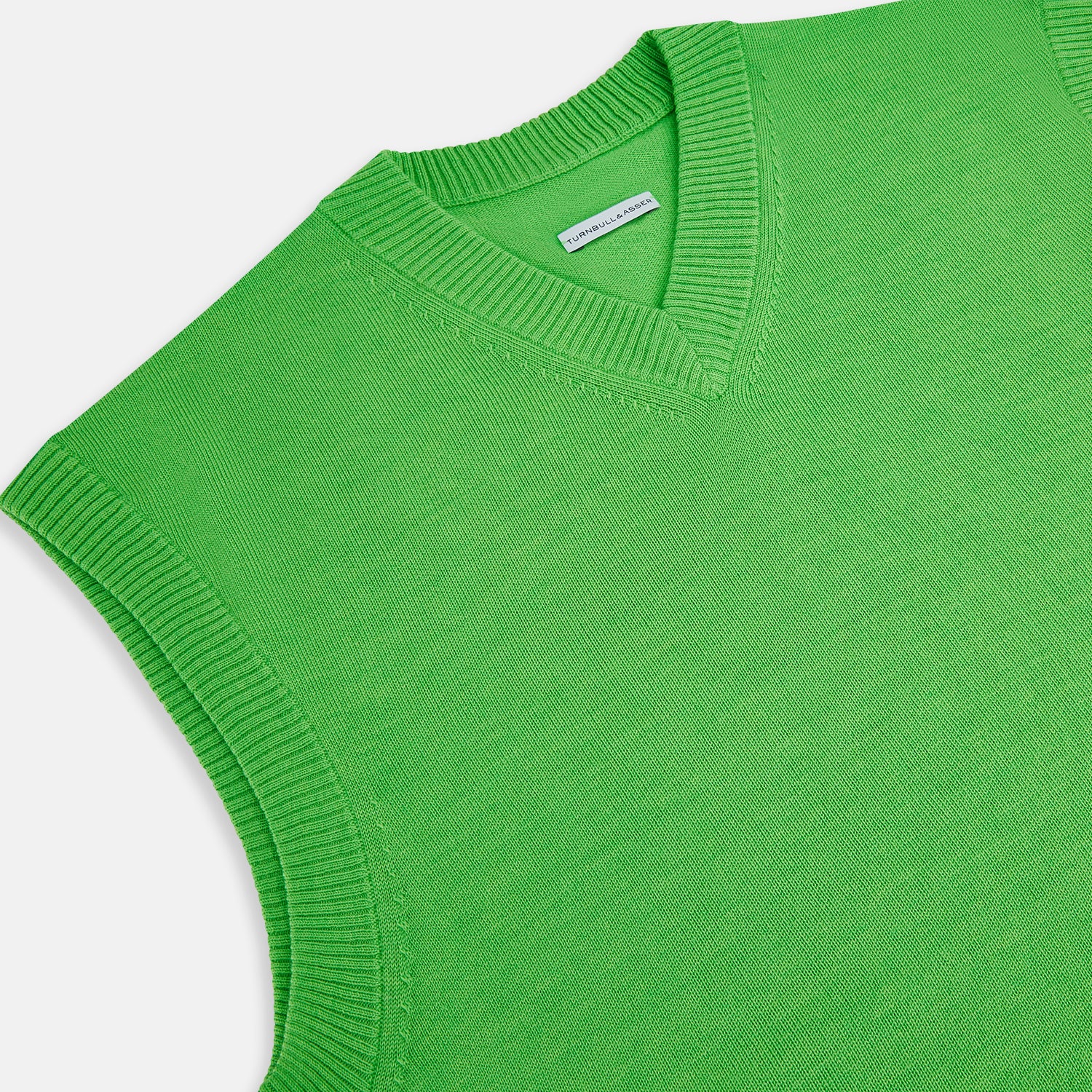 View 2 of product The Turnbull & Asser Lime Green Fine Merino V-Neck Vest, ideal for men, is shown against a plain white background.