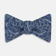 The Turnbull & Asser Pale Blue Paisley Silk Bow Tie, an elegant men's accessory, is showcased against a plain white background.
