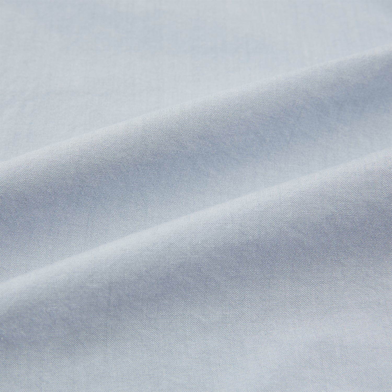 View 6 of product The Turnbull & Asser Grey Hyde Overshirt is a long-sleeve button-up made from sanforised cotton, featuring a single chest pocket and dark buttons, shown against a plain white background.