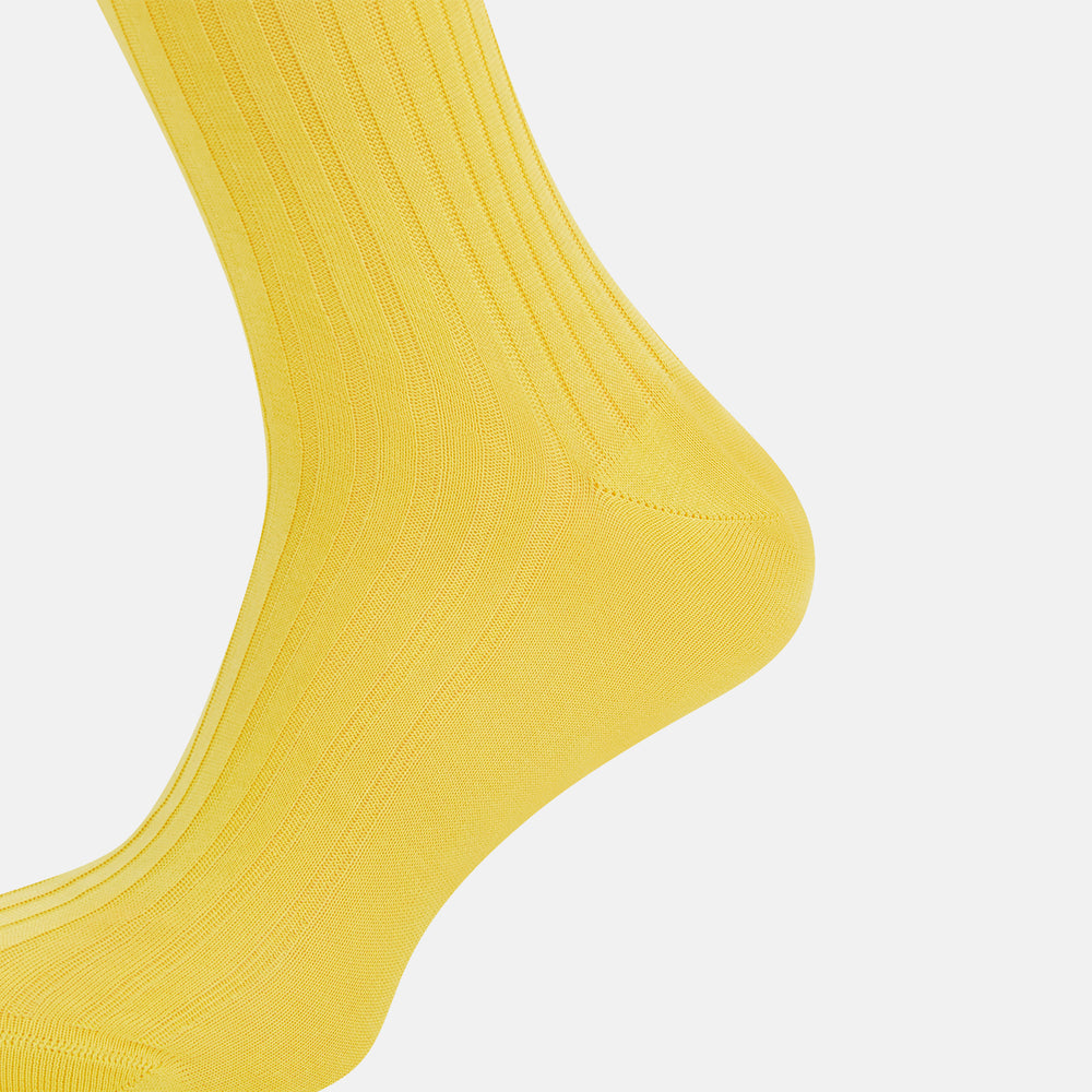 A single Chartreuse Lemon Long Sock by Turnbull & Asser, knee-high with a ribbed texture and made from luxurious Egyptian cotton, is displayed against a plain white background.
