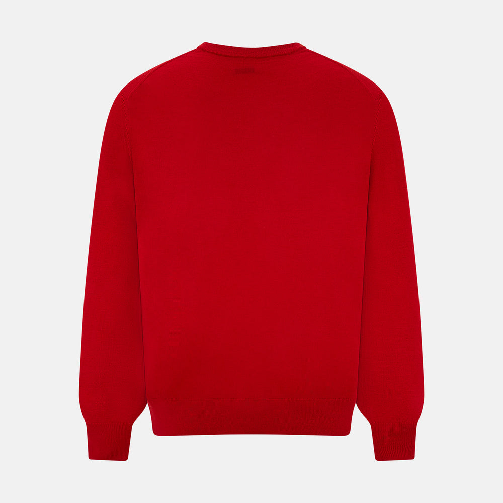 The Turnbull & Asser Red Fine Merino V-Neck Jumper, a classic long-sleeve knitwear piece, is shown on a white background.