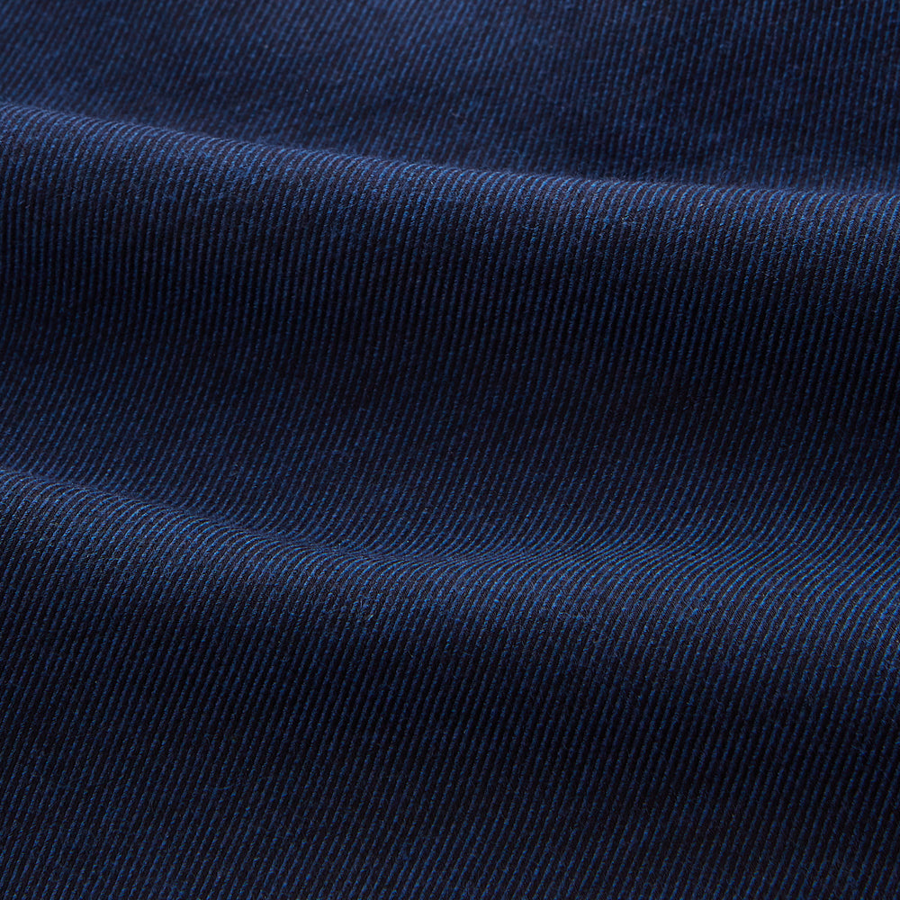 The Turnbull & Asser Navy Weekend Fit Nevis Cotton-Cashmere Shirt features a Dorset collar, 1-button cuffs, and is laid flat on a white background.