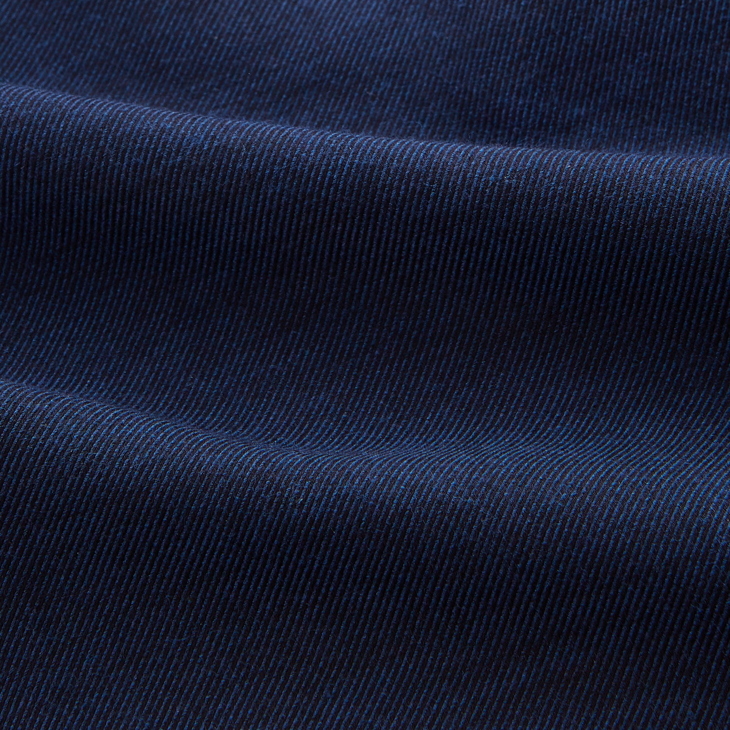 View 4 of product The Turnbull & Asser Navy Weekend Fit Nevis Cotton-Cashmere Shirt features a Dorset collar, 1-button cuffs, and is laid flat on a white background.