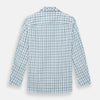 View 3 of product The Turnbull & Asser Green and Blue Check Pyjama Shirt features long sleeves and a button-up design on a white base, offering elegant loungewear style. Shown laid flat against a white background.