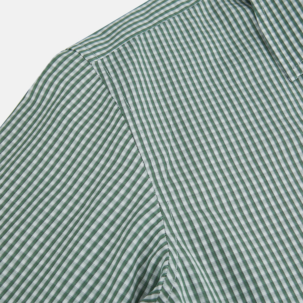 The MELON GREEN MICRO SHADOW CHECK WESTMINSTER SHIRT by Turnbull & Asser is a long-sleeved, button-up shirt with a green and white checkered pattern, pointed collar, and buttoned cuffs, shown on a white background.