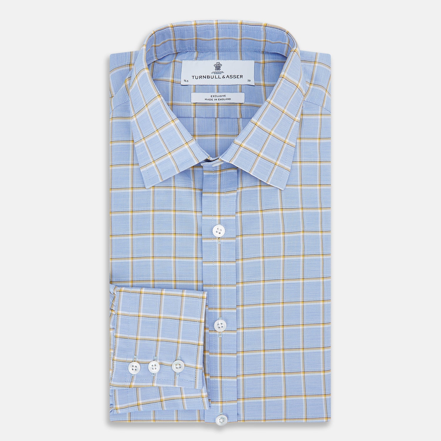 View 5 of product The Turnbull & Asser Blue and Yellow Windowpane Mayfair Shirt is crafted from fine Italian cotton, featuring a light blue base with yellow and white checks, shown on a plain white background.
