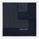 The Navy and White Stripe Silk Pocket Square by Turnbull & Asser features thin white vertical stripes and "TURNBULL & ASSER HAND PRINTED IN ENGLAND" in one corner, with a folded edge showing the reverse of this elegant silk accessory.
