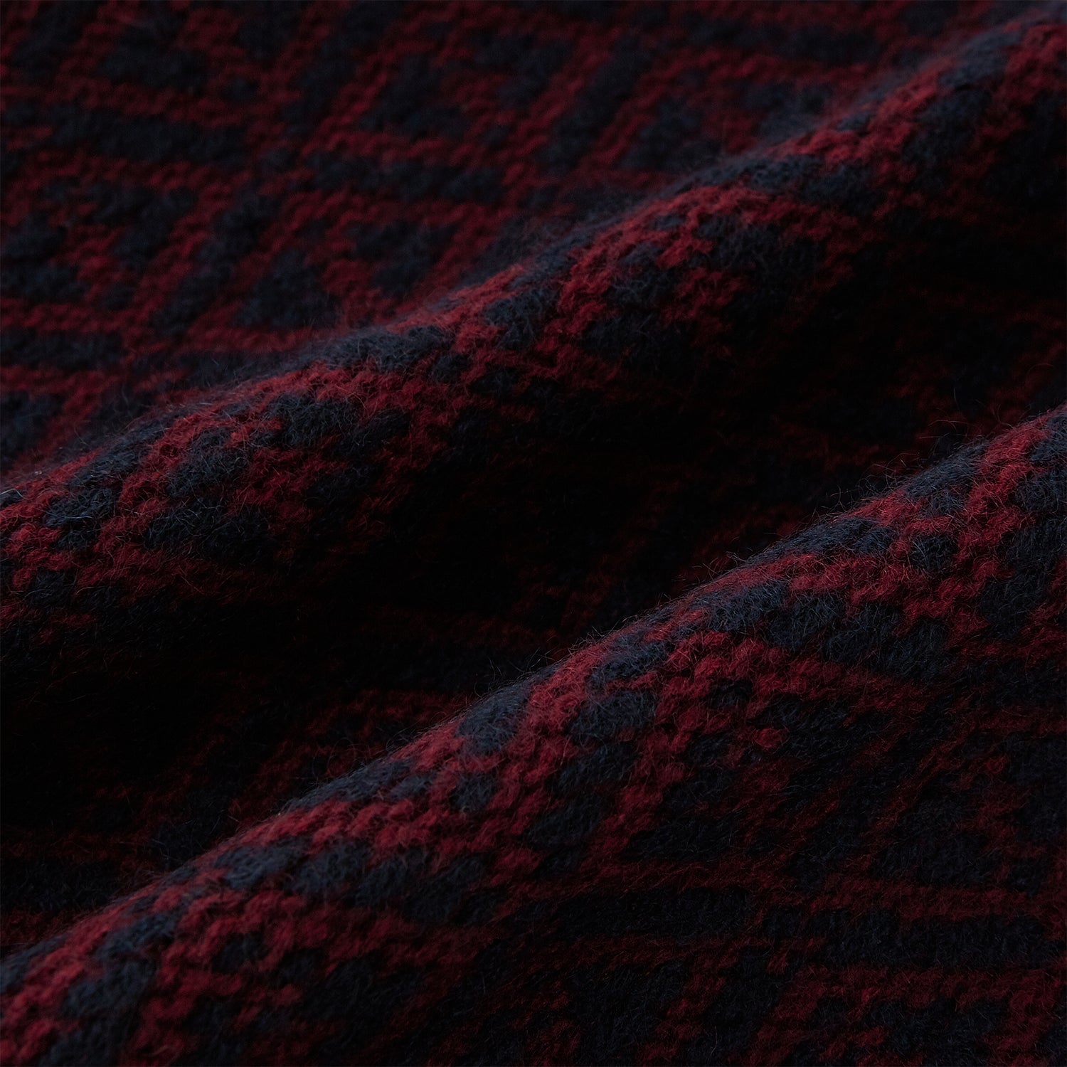 View 3 of product The Turnbull & Asser Navy and Burgundy Diamond-Patterned Cashmere Knitted Scarf, displayed upright on a plain white background, exudes sumptuous softness.