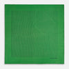 View 3 of product The Hunter Green Stripe Silk Pocket Square by Turnbull & Asser features thin black vertical stripes on one corner and “Turnbull & Asser Hand Printed in England” printed in black, reflecting classic British heritage.