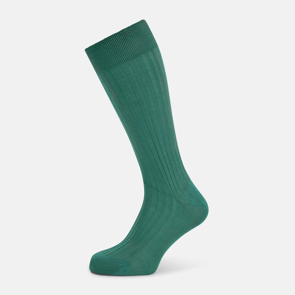 The Turnbull & Asser Sage Mid-Length Sock is shown angled on a white background, emphasizing its ribbed texture and length—a refined, comfortable sock designed for style.