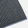 View 2 of product The Turnbull & Asser Dark Chocolate and Pale Blue Hexagon Cashmere Knitted Scarf is elegantly looped against a white background—an essential geometric accessory for any wardrobe.
