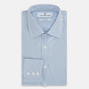 View 5 of product The Turnbull & Asser Blue Micro Shadow Check Mayfair Shirt features a long-sleeve, button-up design with a small blue and white check pattern, pointed T&A collar, and classic cuffs.