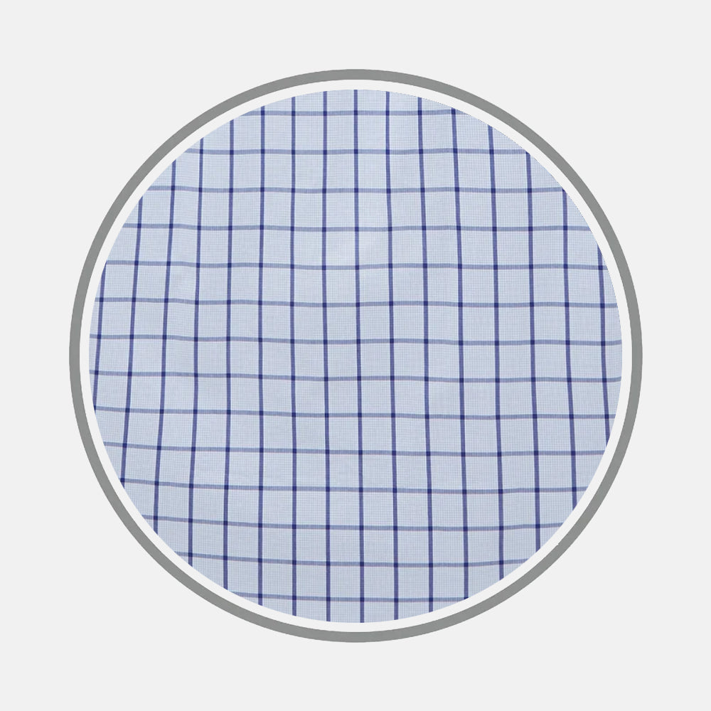 A close-up of Turnbull & Asser's Navy Blue Windowpane Check Fabric, showcasing its blue checkered grid on white, viewed within a circular frame against a light gray background.