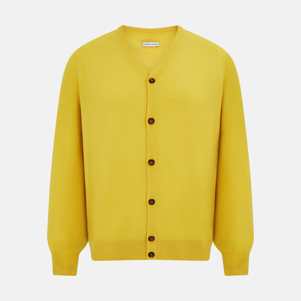 The Turnbull & Asser Canary Yellow Fine Merino V-Neck Cardigan features long sleeves, a button front with brown buttons, and ribbed cuffs and hem, displayed on a plain white background.