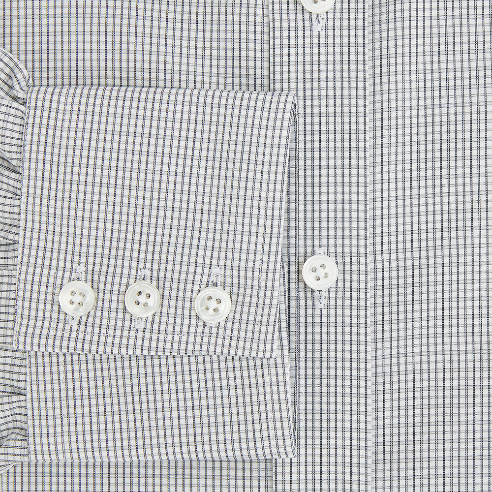 The Midnight Blue Micro Tattersall Check Mayfair Shirt by Turnbull & Asser, made from pure cotton with white buttons, a classic collar, and cuffed sleeves, is laid flat on a white background.
