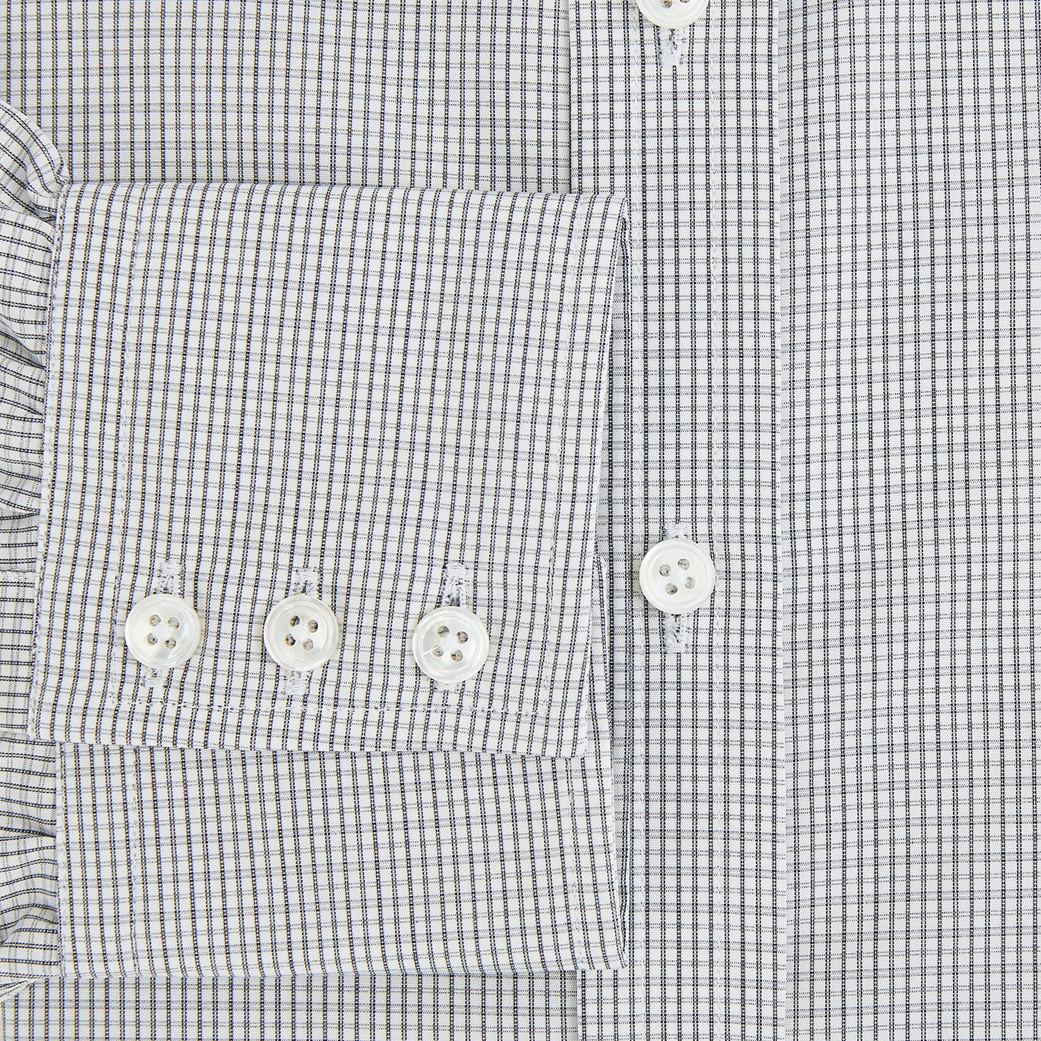 View 4 of product The Midnight Blue Micro Tattersall Check Mayfair Shirt by Turnbull & Asser, made from pure cotton with white buttons, a classic collar, and cuffed sleeves, is laid flat on a white background.