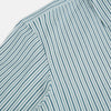 View 6 of product The GREEN DOUBLE STRIPE WESTMINSTER SHIRT by Turnbull & Asser features green and white vertical stripes, a pointed collar, buttoned cuffs, and a relaxed fit that highlights refined British craftsmanship.