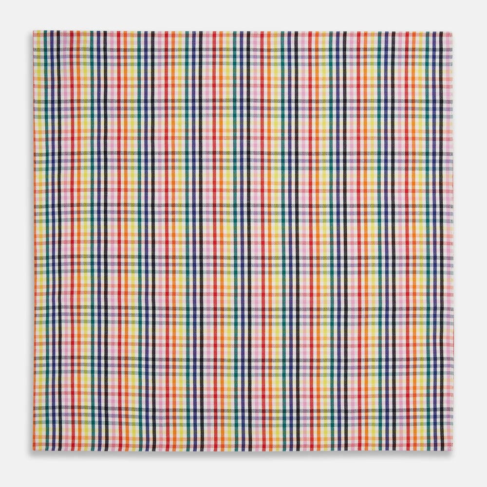 The Turnbull & Asser Hand Rolled Multi-coloured Grid Check Handkerchief features intersecting red, yellow, green, blue, and orange stripes on white—a vibrant and versatile gentleman’s accessory.