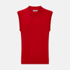 View 1 of product The Turnbull & Asser Red Fine Merino V-Neck Vest is a men's sleeveless jumper featuring ribbed edges, showcased against a plain white background.
