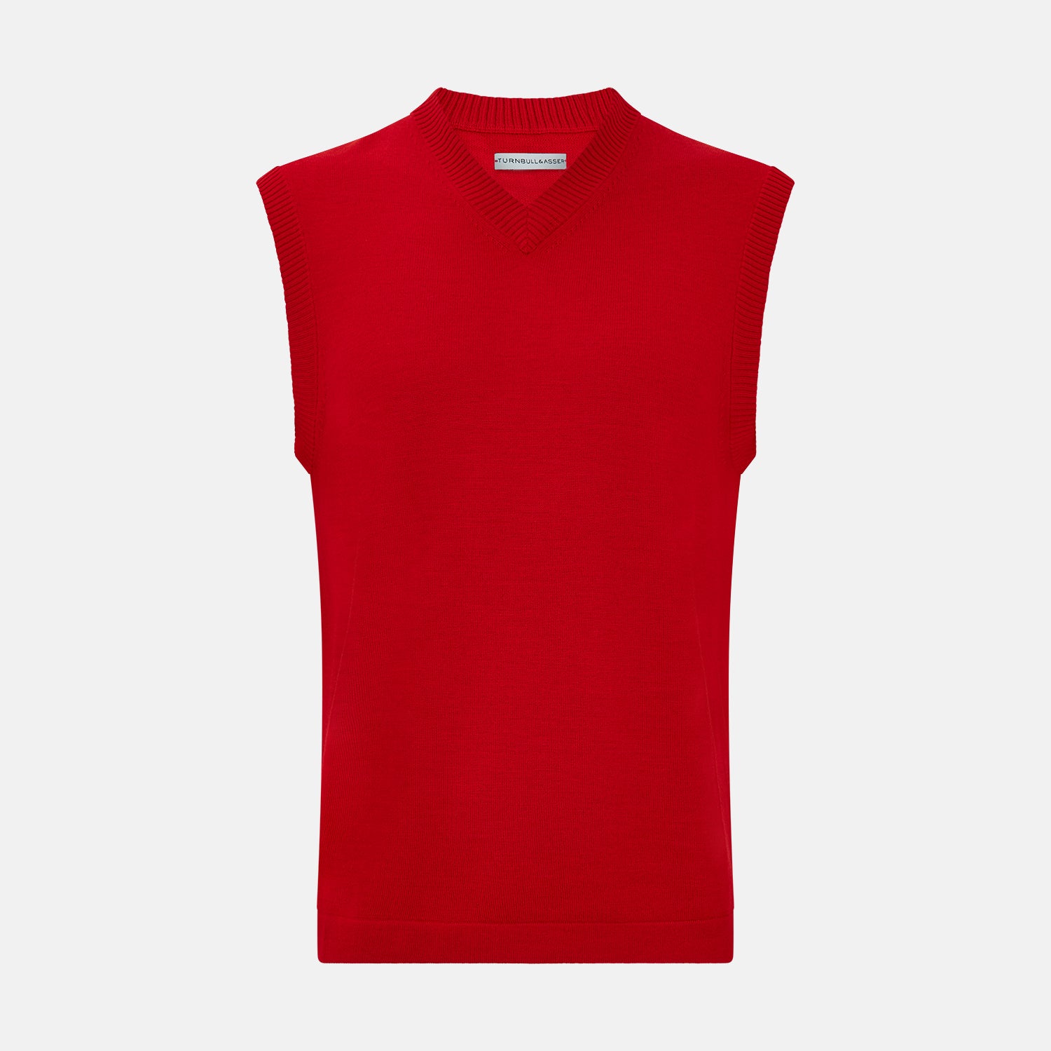 View 1 of product The Turnbull & Asser Red Fine Merino V-Neck Vest is a men's sleeveless jumper featuring ribbed edges, showcased against a plain white background.