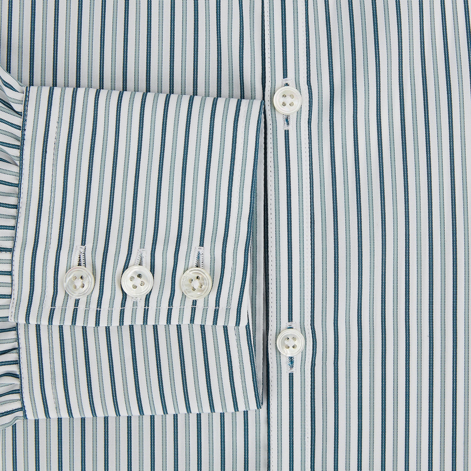 View 4 of product The GREEN DOUBLE STRIPE WESTMINSTER SHIRT by Turnbull & Asser features green and white vertical stripes, a pointed collar, buttoned cuffs, and a relaxed fit that highlights refined British craftsmanship.