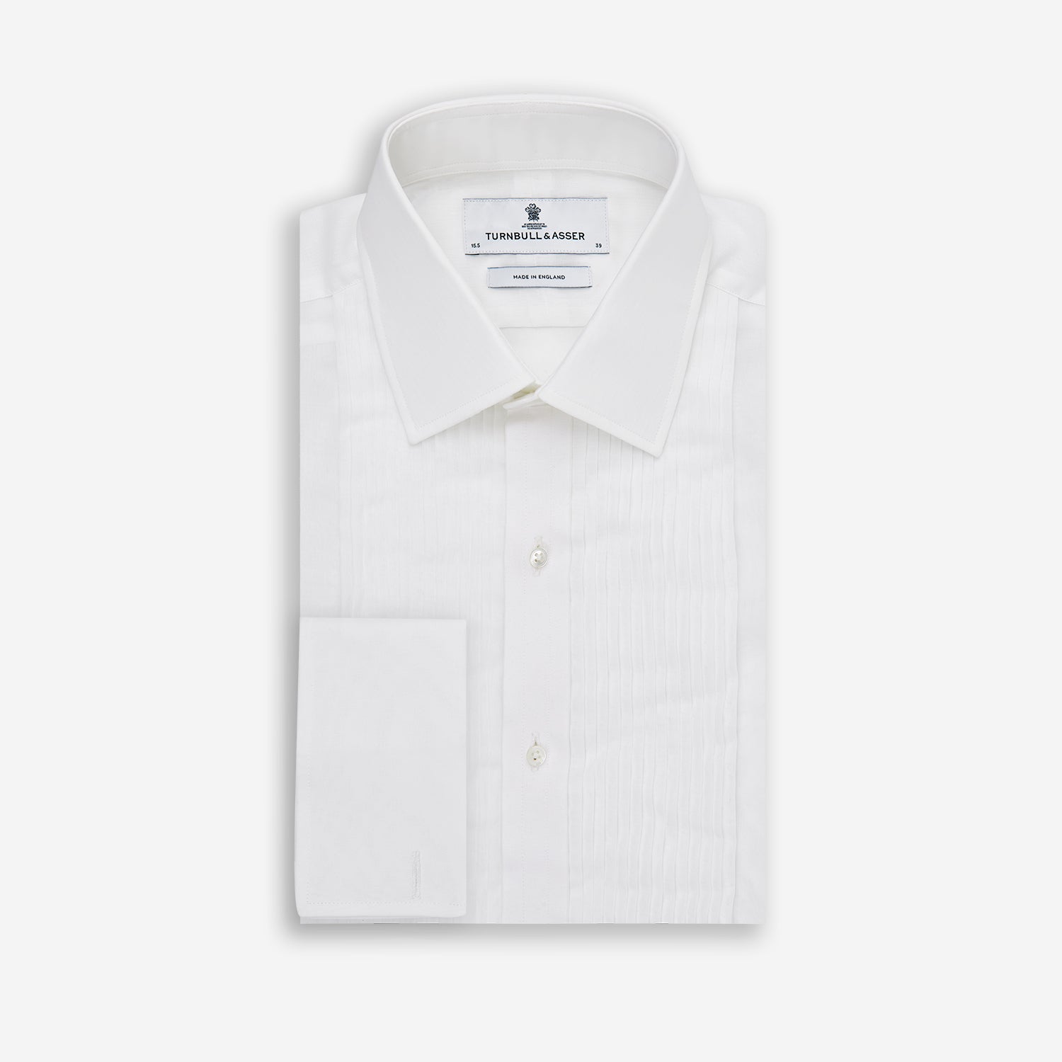 View 6 of product The Die Another Day Inspired Voile Dress Shirt by Turnbull & Asser features a white pleated front, button-down closure, and classic collar—laid flat on white to showcase its timeless James Bond style.
