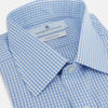 View 2 of product The Turnbull & Asser Light Blue Gingham Check Shirt features a T&A collar, 3-button cuffs, classic gingham pattern, and white buttons down the front, shown laid flat on a white background.