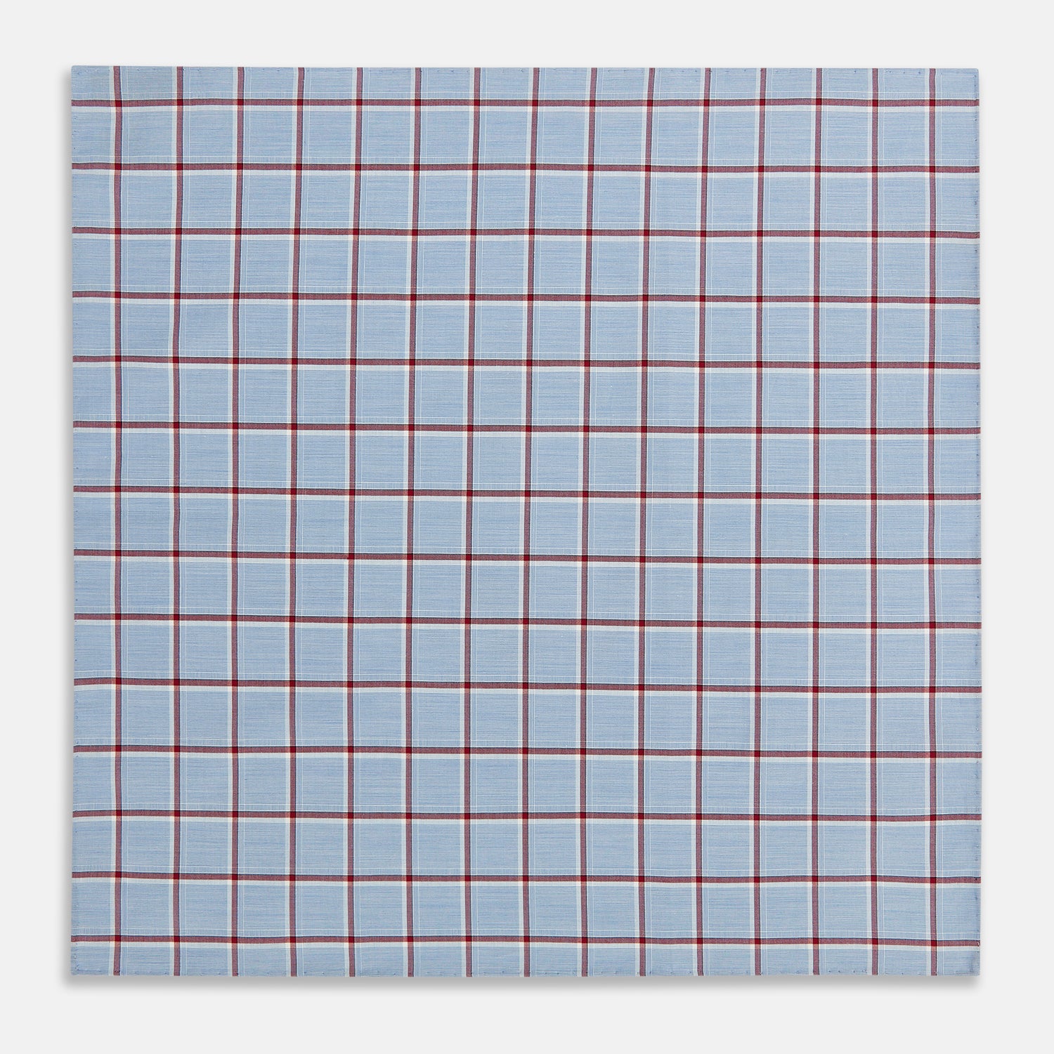View 2 of product The Turnbull & Asser Blue and Burgundy Windowpane Check Hand-Rolled Handkerchief features a light blue fabric with white, red, and dark blue stripes forming a classic plaid grid.