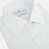 View 2 of product The White Mayfair Shirt by Turnbull & Asser features a classic collar, white buttons, and an inner branded label, all neatly crafted from premium sanforised cotton for lasting quality.