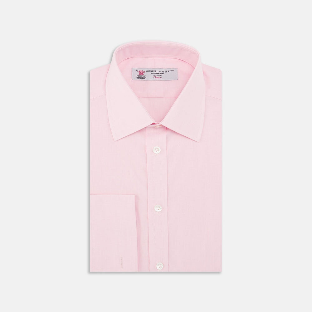 A circular Pink End-on-End Cotton Fabric by Turnbull & Asser, featuring a thin gray border and a textured light pink center, is displayed on a plain white background.