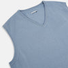 View 2 of product The Frost Blue Cashmere V-neck Vest by Turnbull & Asser features a sleeveless knit design and ribbed edges, shown on a white background—a sophisticated addition to gentleman’s fashion.
