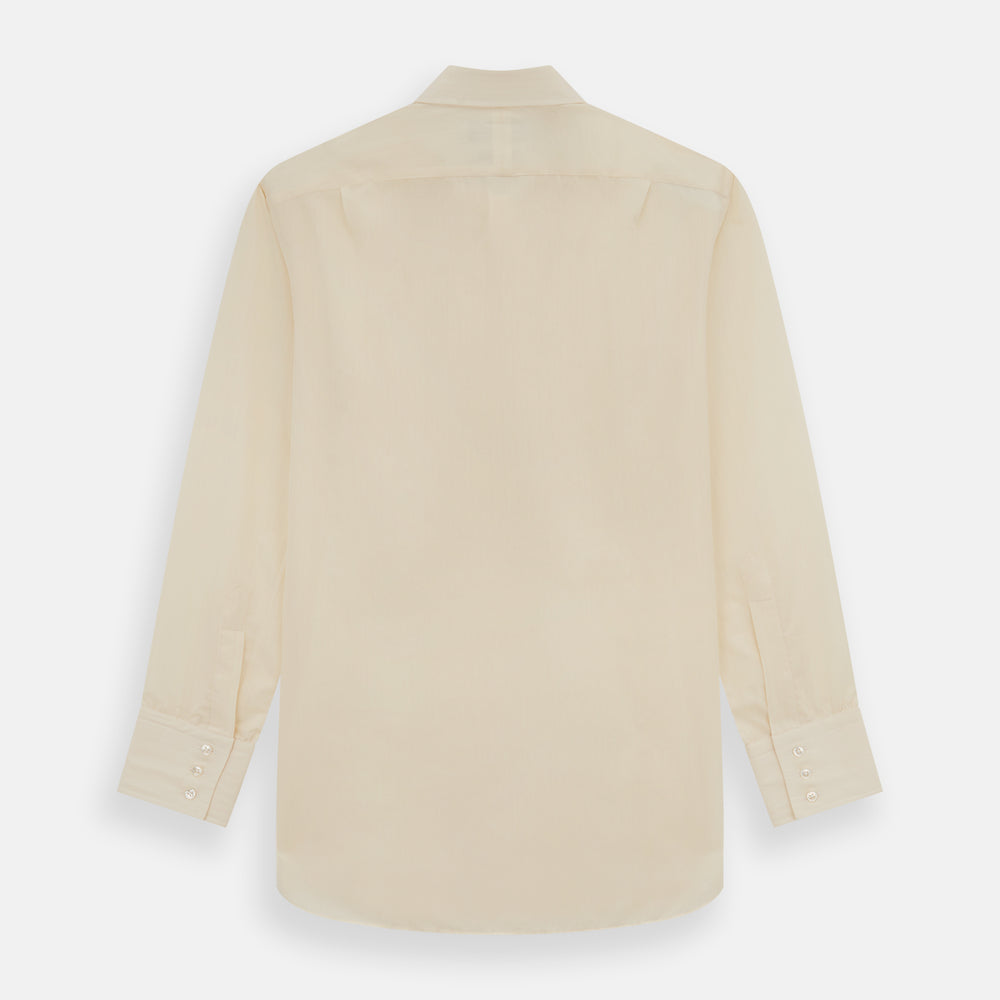 The Cream Fine Pencil Stripe Mayfair Shirt by Turnbull & Asser features long sleeves, a pointed collar, and buttoned cuffs. Crafted from breathable cotton with fine pencil stripes, it is shown laid flat on a white background.