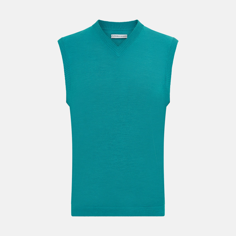 Turnbull & Asser's Turquoise Fine Merino V-Neck Vest features ribbed edges and a sleeveless design, ideal for a refined look, shown against a plain white background.
