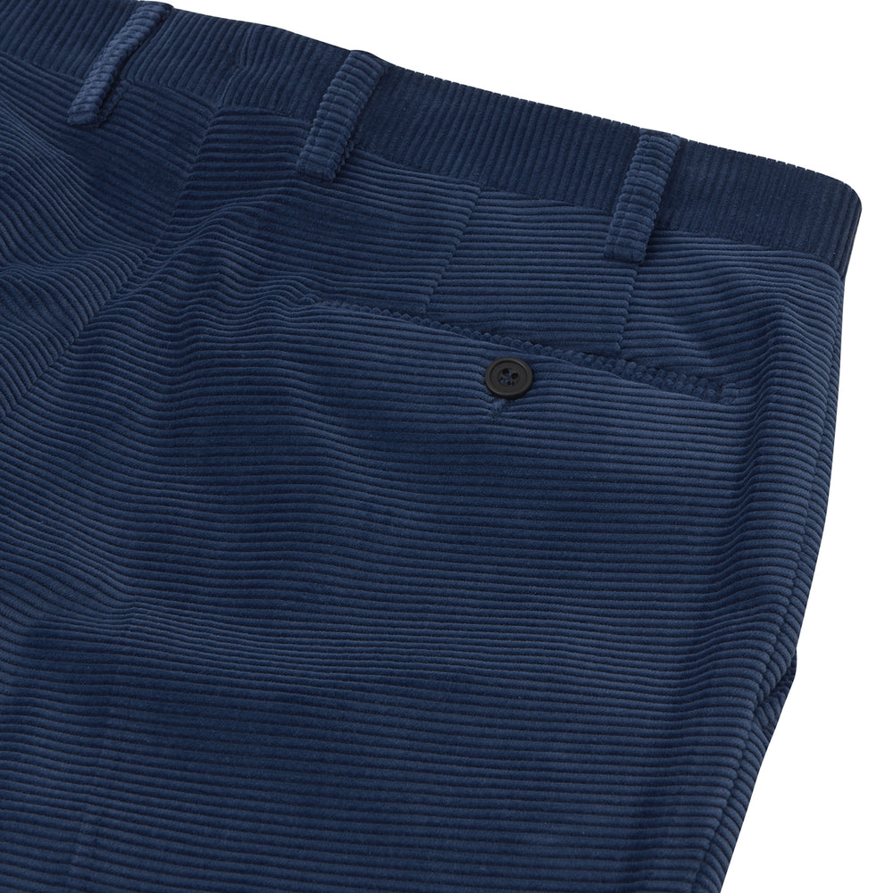Turnbull & Asser Navy Plain Trousers: tailored slim-fit design with belt loops, front pockets, and button closure, shown against a white background.