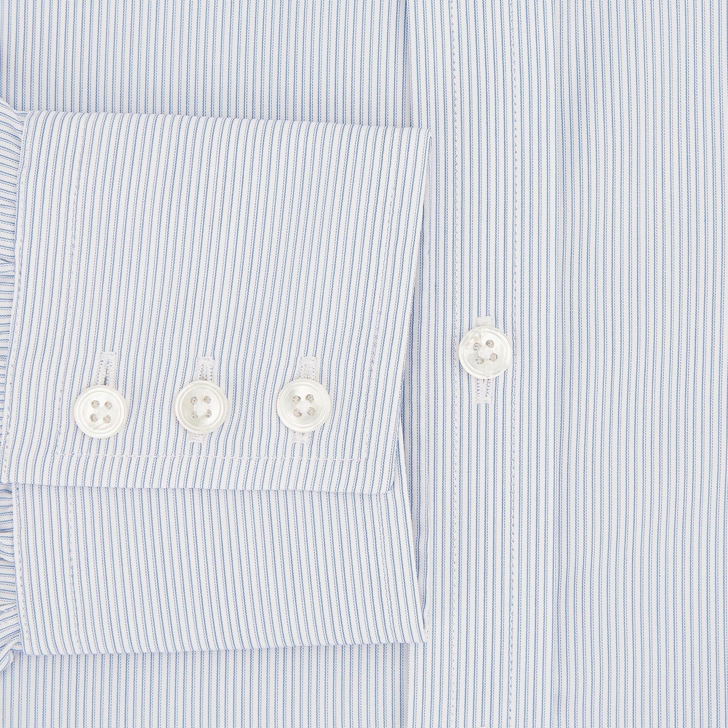 View 4 of product The Turnbull & Asser Sky Blue Hairline Multi Stripe Mayfair Shirt features Italian cotton, long sleeves, a classic collar, white buttons, and a subtle stripe pattern, shown on a plain white background.