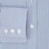 View 4 of product The Turnbull & Asser Pale Blue Pinstripe Mayfair Shirt features pale blue pinstripes, a classic T&A collar, white buttons, and cuffed sleeves, shown against a plain white background.