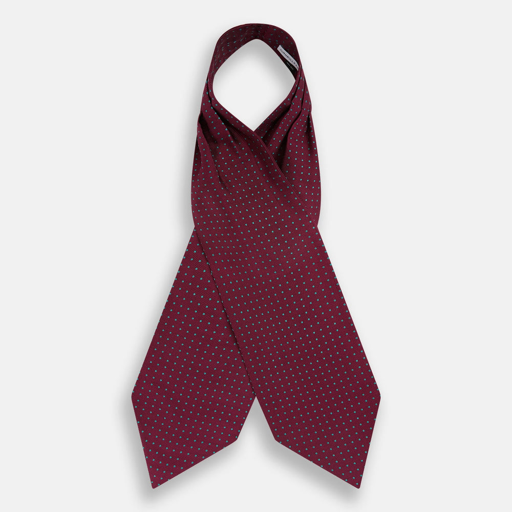 The Turnbull & Asser Blue and Burgundy Micro Dot Silk Cravat features a subtle pattern, making it a refined formal accessory that adds elegance to your outfit.