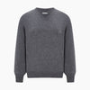 View 5 of product The Turnbull & Asser Storm Grey Cashmere V-neck Jumper features long sleeves, ribbed cuffs and hem—versatile knitwear shown on a white backdrop.