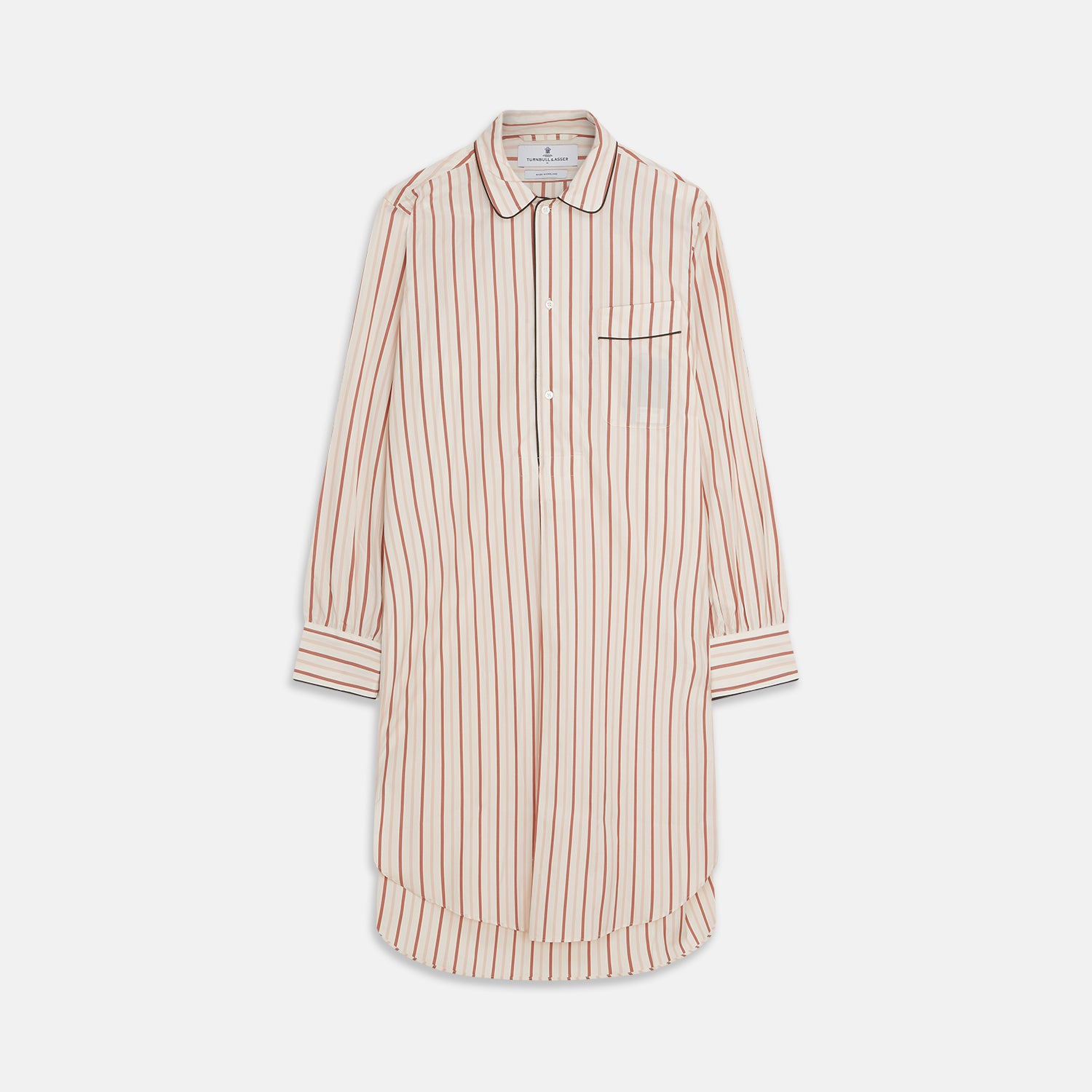 View 1 of product The Burgundy Multi Striped Cotton Sussex Nightshirt by Turnbull & Asser features long sleeves, knee length, a pointed collar, chest pocket, burgundy and beige stripes on white, buttoned cuffs, and a curved hem for classic sleepwear style.