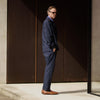 View 4 of product The Navy Tailored Pinstriped Shirt Jacket by Turnbull & Asser is a smart-casual, lightweight cotton-linen piece with long sleeves, a collar, left chest pocket, and front buttons for easy style.